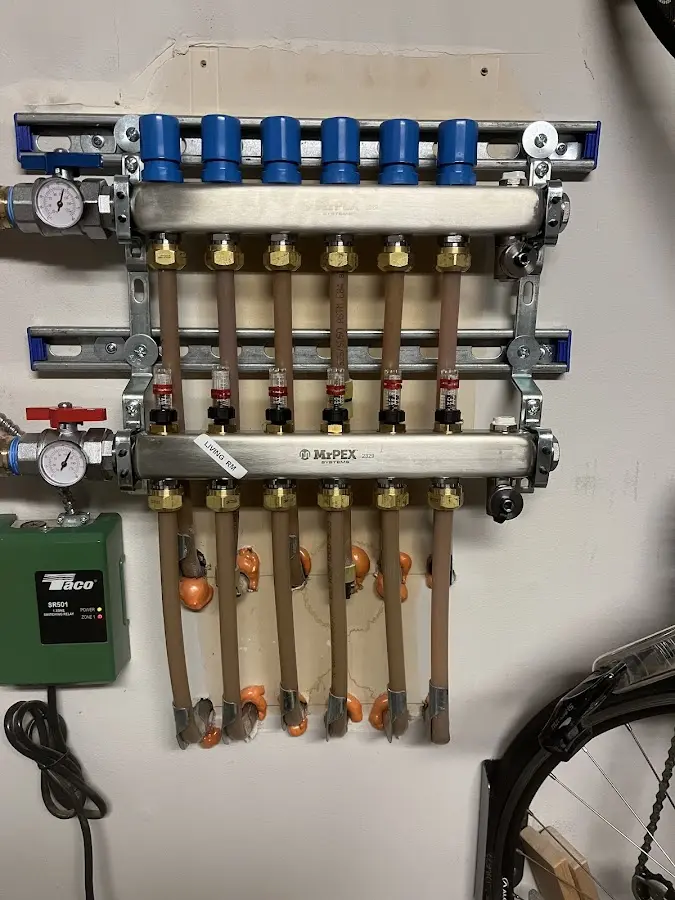 Plumber performing Water Heater Repair at a residential property in Sawmills